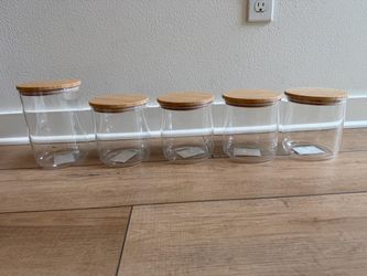 Cute glass canisters - new. Food and dishwasher safe.