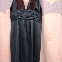 Brand New with tag dk green & black dress size 6.  $20.00 OBO