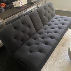Black Couch Futon Lays Down Into A Bed