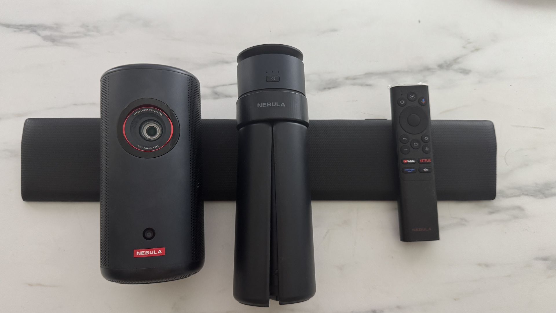 Nebula Capsule 3 (Latest Variant) – 1080p Google TV Projector + Power Bank Tripod + 75” Screen Bundle