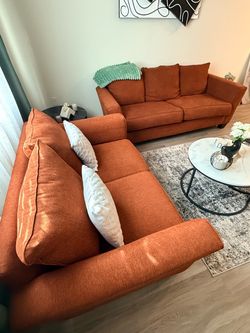 Gently used Orange Sofa and Loveseat