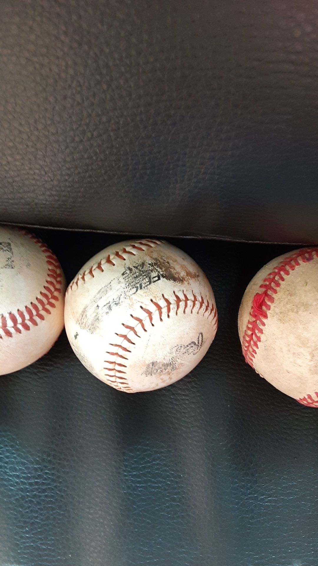 4 baseball balls