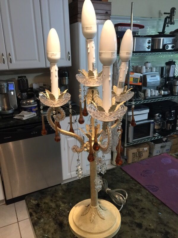 Vintage upright chandelier with four candelabra lights and hanging color glass crystals. 25" tall