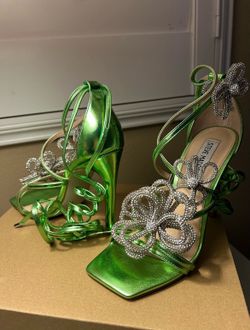 Lime green wrapped around high heels with diamond flowers