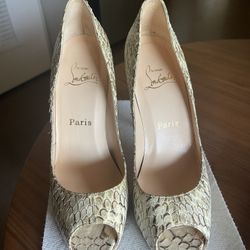 Christian Louboutin Red Bottoms (sz 37)