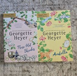 (LOT of 2 Books)
Two Classic Historical Romance Paperbacks from the Georgette Heyer Signature Collection: THESE OLD SHADES (left) and ARABELLA (right)