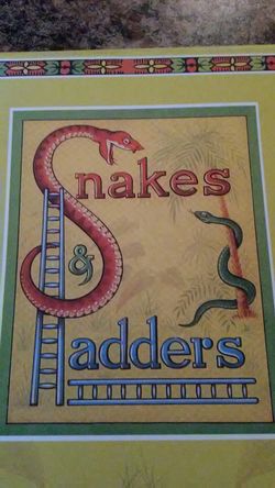 Snakes and ladders board game