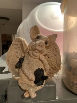 Pig angel figurine