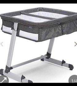 Delta Children Simmons Kids' By The Bed City Sleeper Bassinet For Twins - Gray  Open box item
