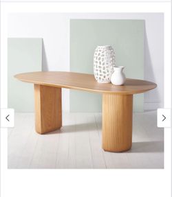 Oval Wood Dining Table with Ribbed Pedestal Legs