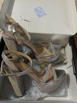 Silver sparking heels size 5.5