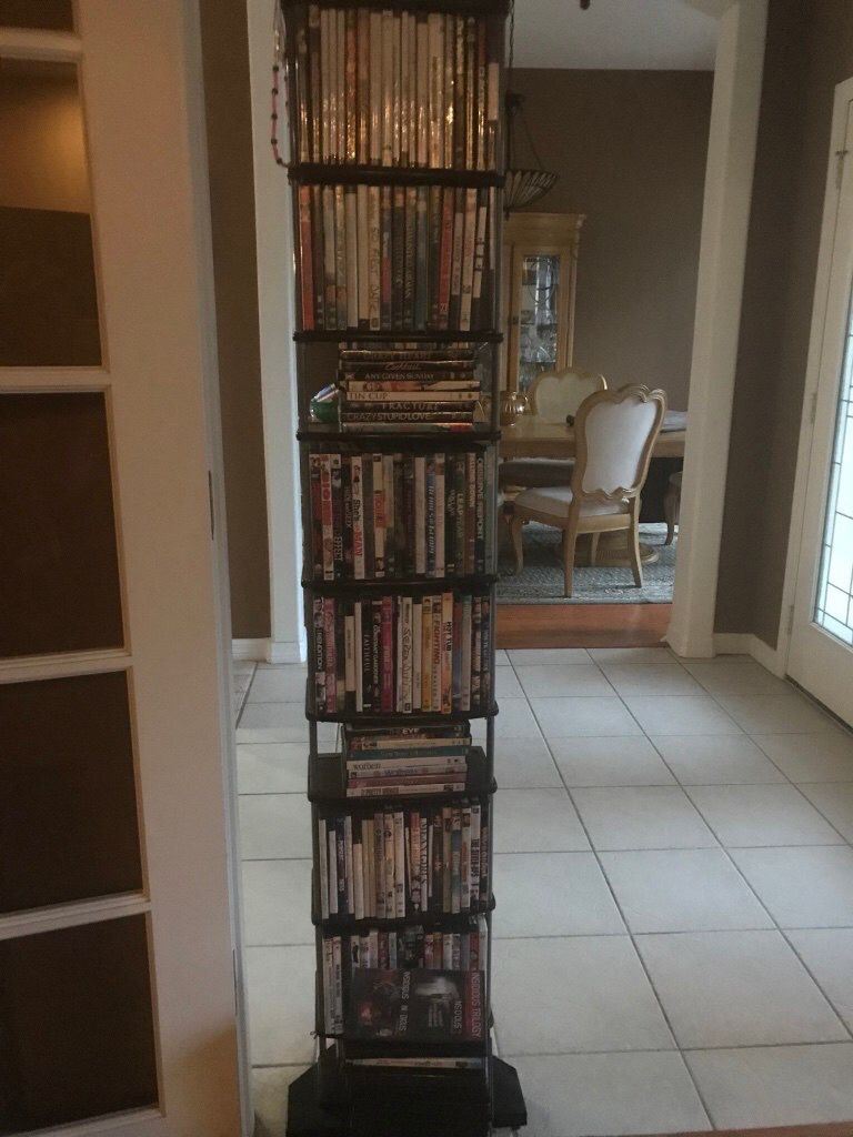 Over 100 DVD’s w/stand