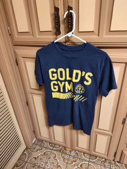 Three Gold gym t-shirts accent conditions each $3 or all for    $6. Size Medium