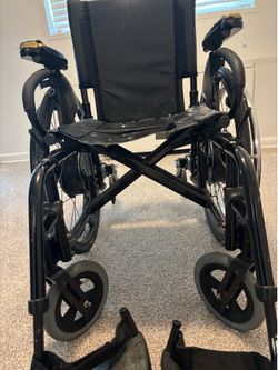 Two Power wheelchairs