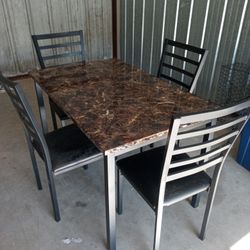 Light Metal Table And Chair Set.