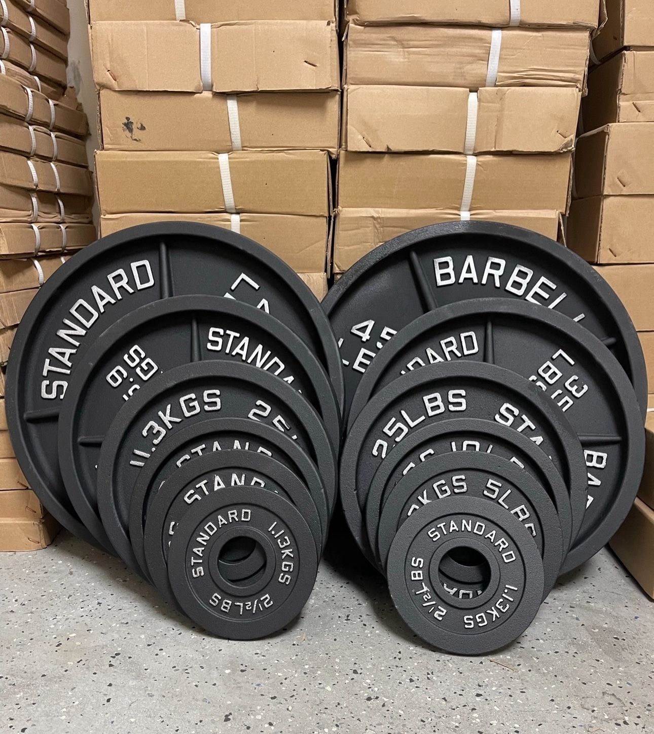 Cast Iron Olympic weights 245 Lb Set Brand New Still In The Box