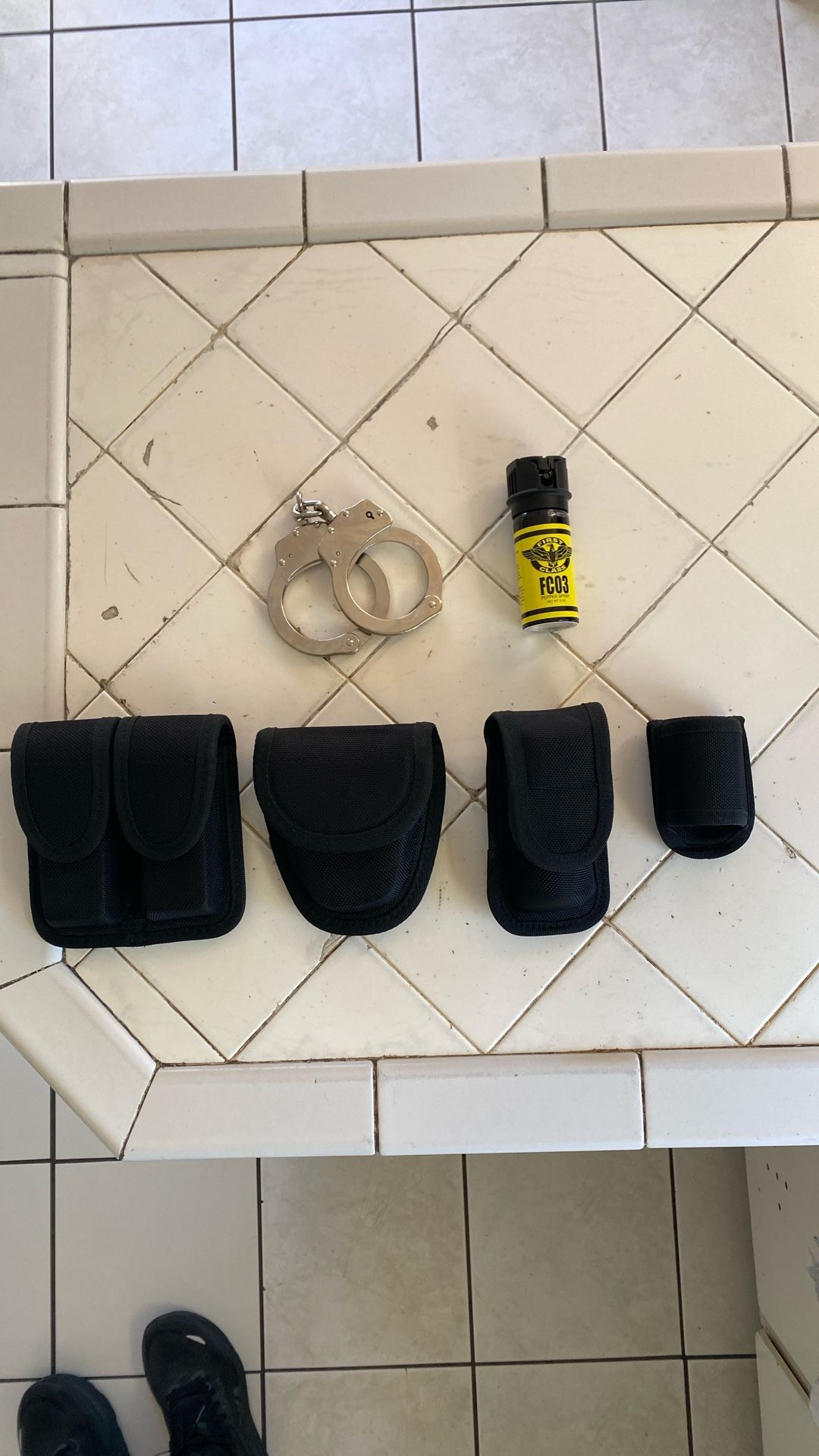 Security equipment clip, case handcuff, case pepper spray, case, flashlight case pepper, spray$10and handcuffs $20