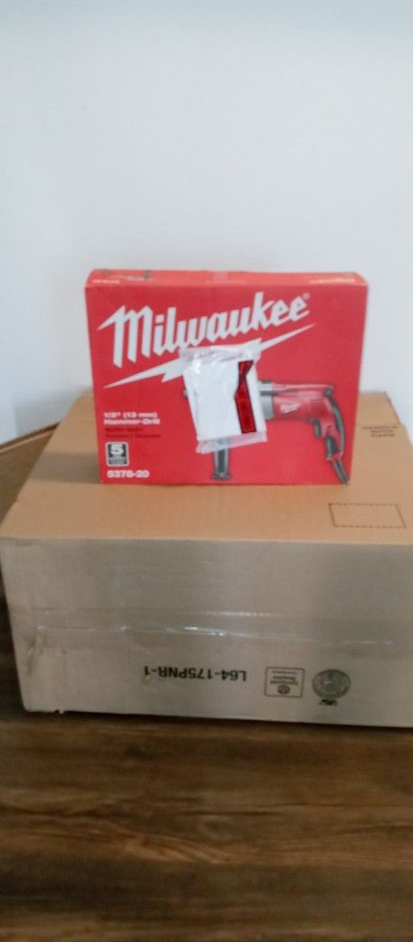MILWAUKEE'S Electric Drill
New Open Box Never Used.