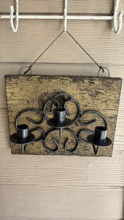 Rustic Vintage Iron Candle Sconce on Wood