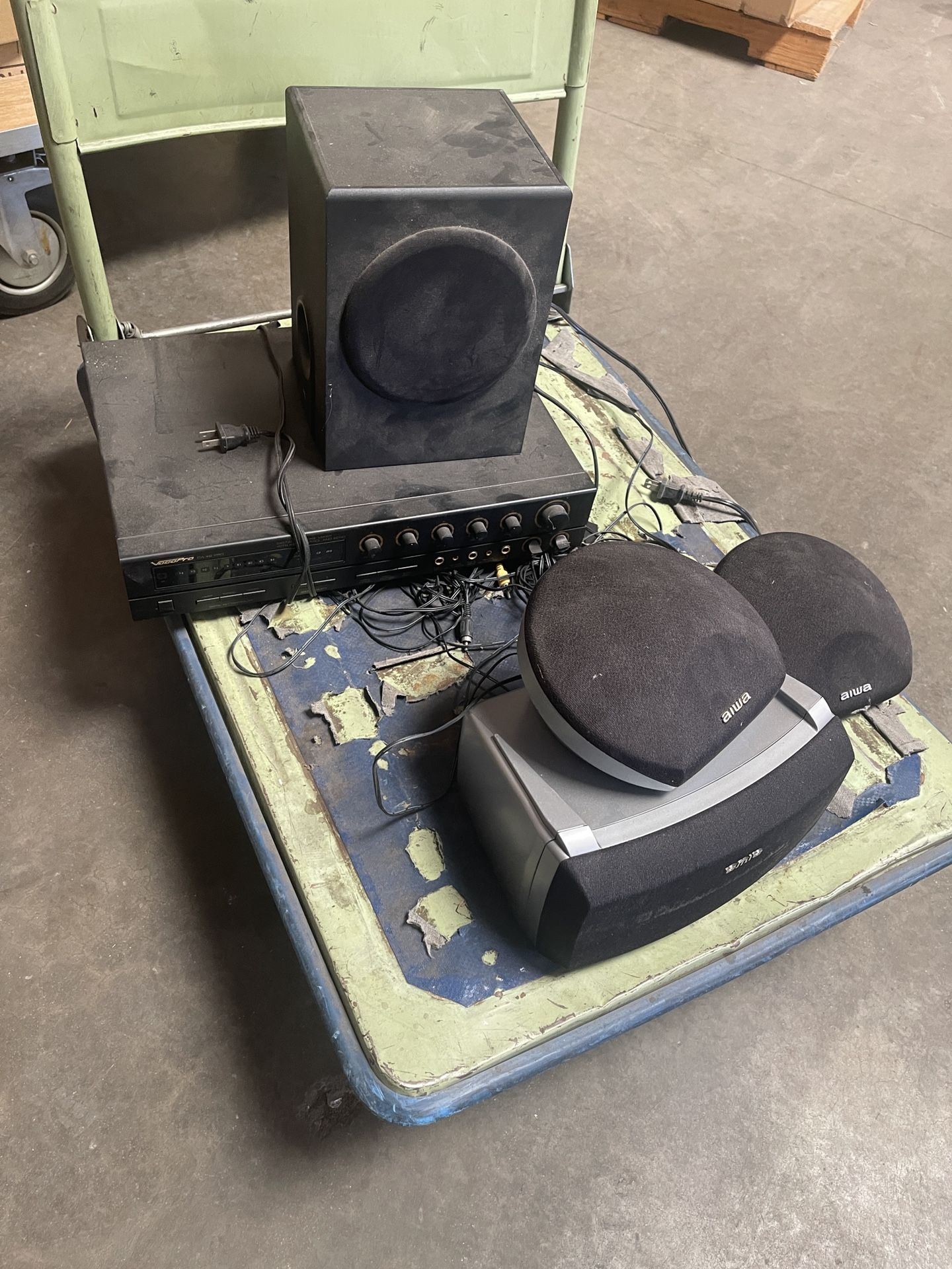 Vintage karaoke system with amplifier and speakers.