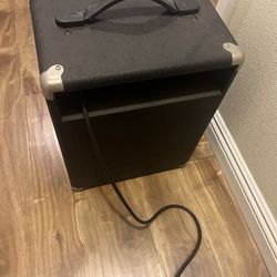 Acoustic guitar tuner speaker