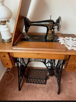 Non-functioning *Antique Singer Treadle Sewing Machine with Cabinet