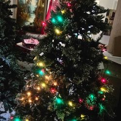 Christmas Tree 7.5 feet with snow, lights. 