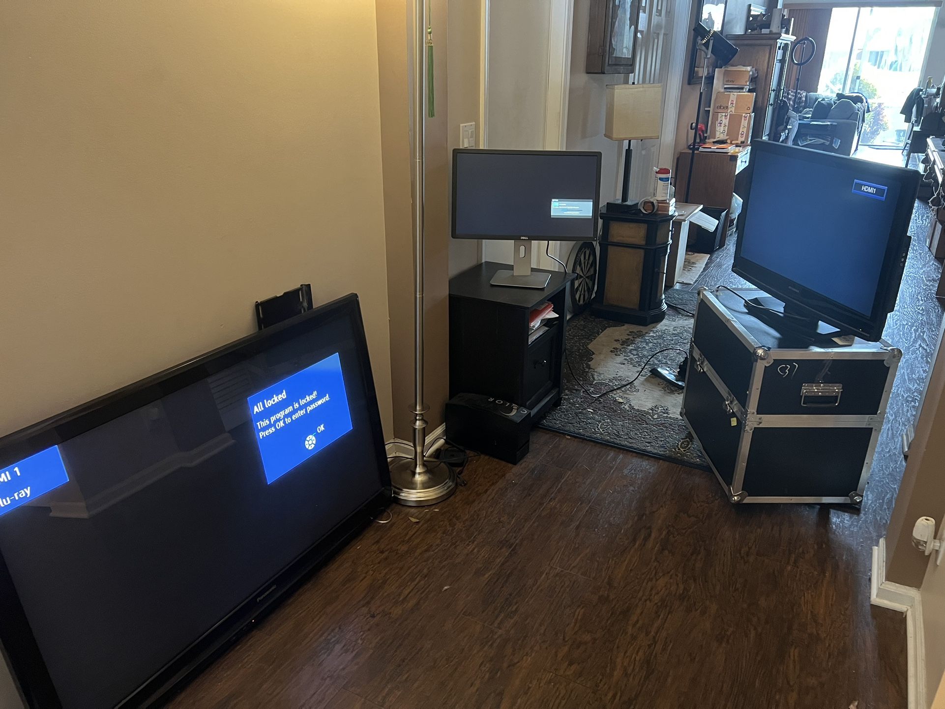 Panasonic 57” Flat Screen Tv, Sylvania 32” LCD Tv, Dell 24 LED Monitor