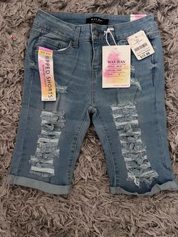 Ripped shorts Bermuda length