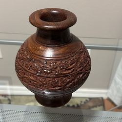 Carved wooden vase