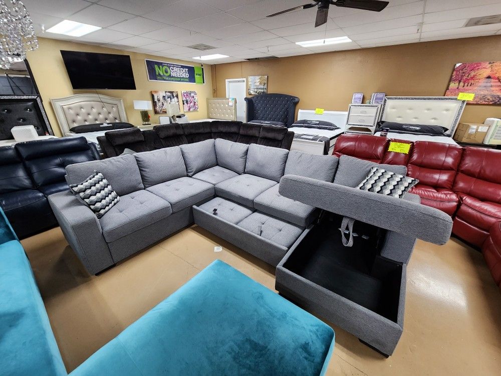 Gray Sleeper Sectional With Storage And Pillows Included