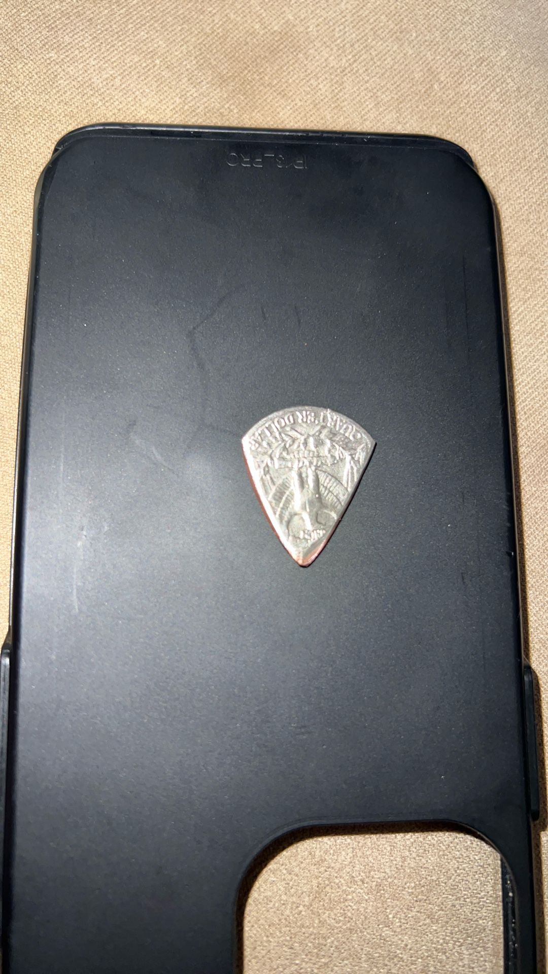 Quarter Guitar Pick