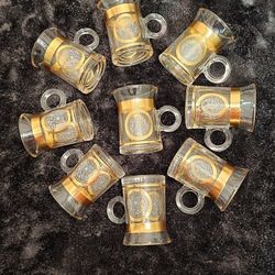 9 Little tea glasses.