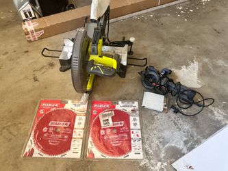 Corded Ryobi 12” Miter Saw, Two 12” Diablo Blades, Table with two clamps