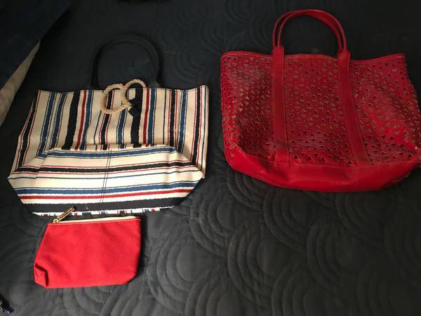 ****2 BAGS FOR SALE- LIKE NEW CONDITION**** STRIPED BAG IS CLOTH/CANVAS RED BAG IS HEAVY GOOD QUALITY PLASTIC $12 EACH OR 2 FOR $20