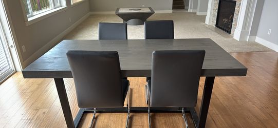Modern rectangular dining table used to stage a $4 million house