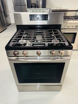 Samsung stainless steel natural gas stove; includes a receipt for a 90-day warranty.