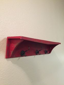 Rustic wall shelf with hooks