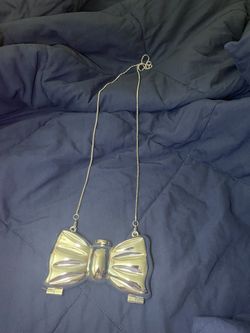 Small Sliver Bow Shaped Purse