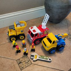 Dump truck, fire truck tow, truck. Machine Maker. 5 Toy Workers. Like New.