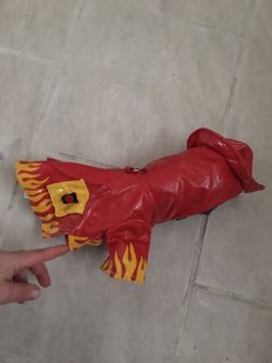 Cute fire fighter dog Halloween costume for a small dog.
