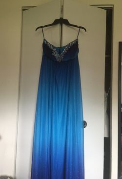 Sparkly blue dress. Size 7/8 perfect condition. $35 OBO