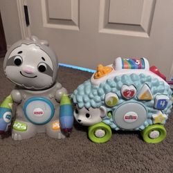 Two Fisher-Price Moving Light Up And Singing Toys