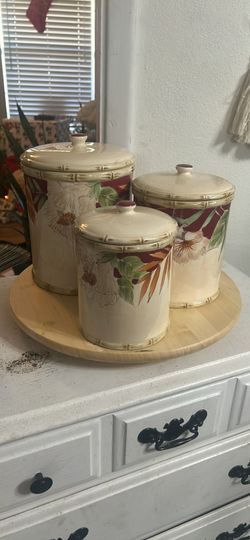 Brand new ceramic canister set with Lazy Susan spinner included
