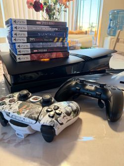 PS5 Pro w/ Black Plates, 2 controllers + more