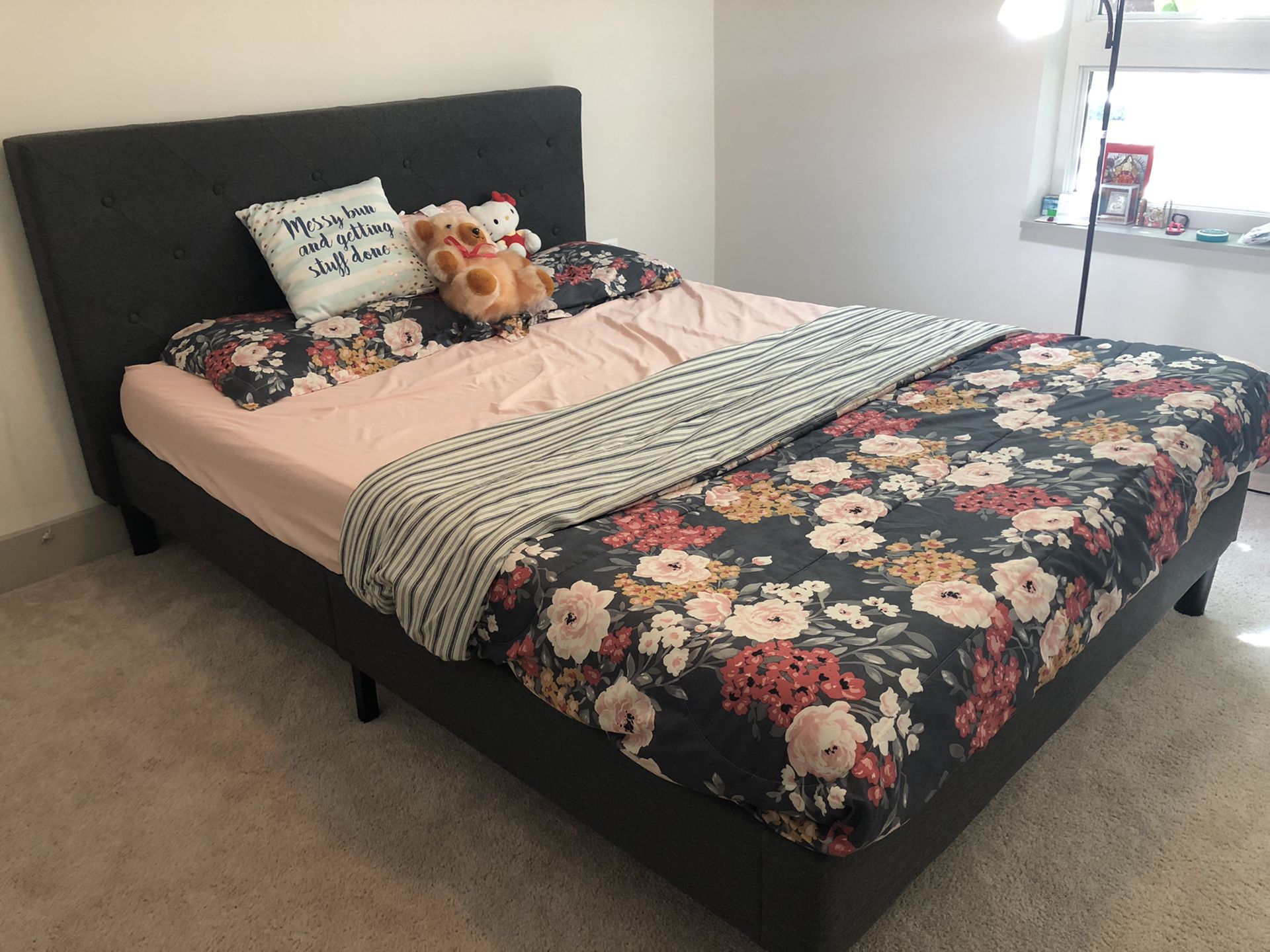 Queen bed with mattress for sale.