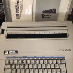 Smith Corona Typewriter  With Accessories 