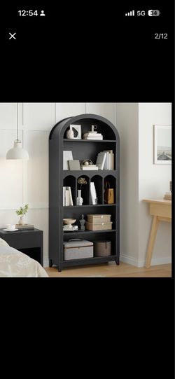 Brand new large black book shelf! Needs to go ASAP