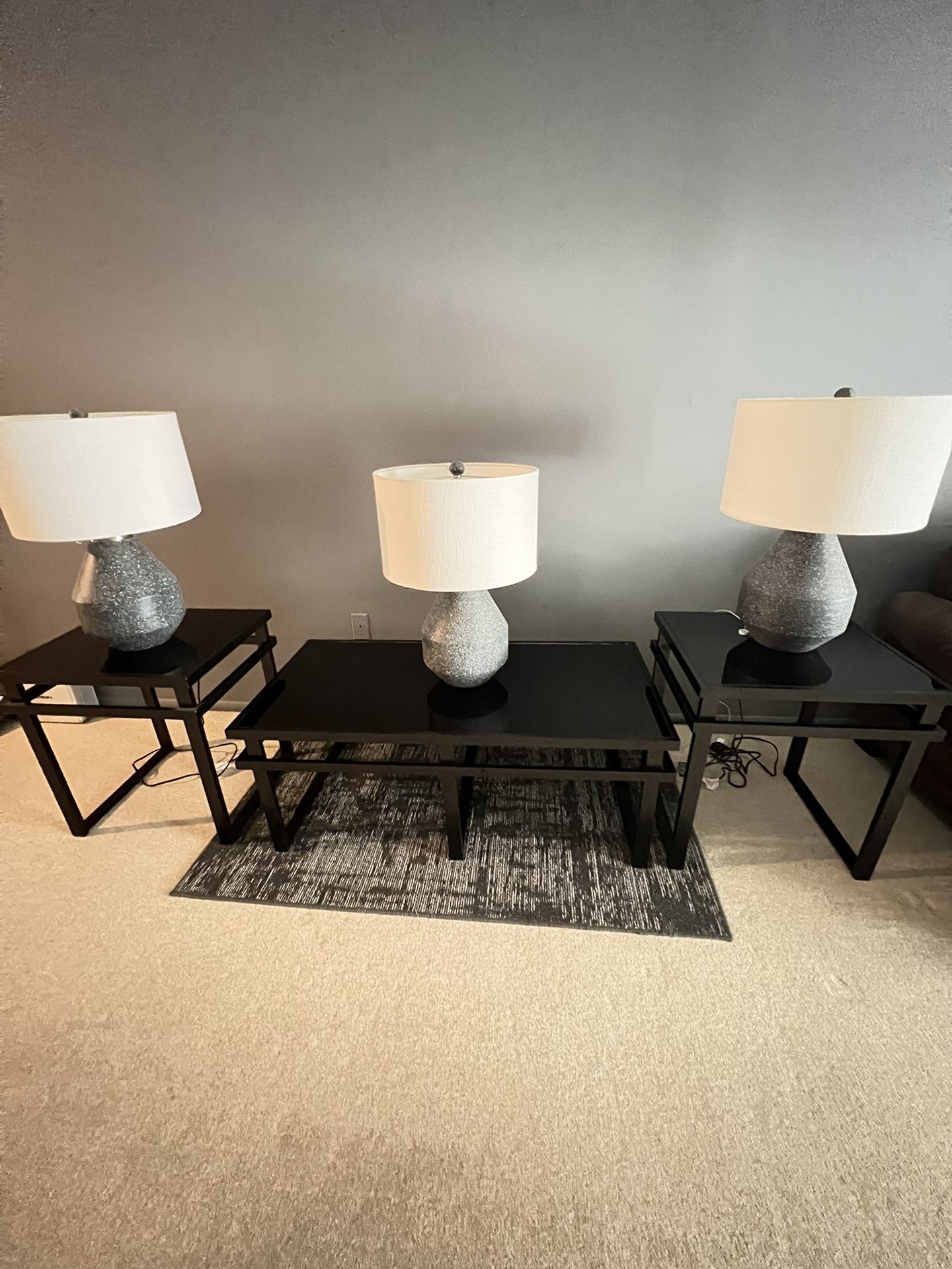 Coffee And End Black Glass Tables.