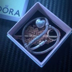 Gold Bracelet And A Pandora Bracelet 